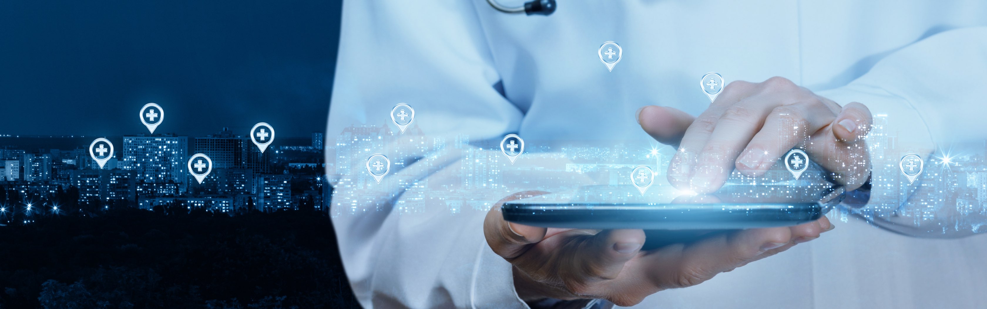 Mann mit Tablet in der Hand und verschiedenen Icons