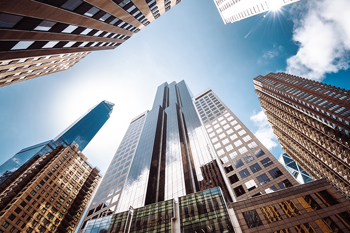 view of a skyline of buildings from a low point of view