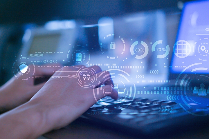 person working at their computer with digital lock and privacy icons