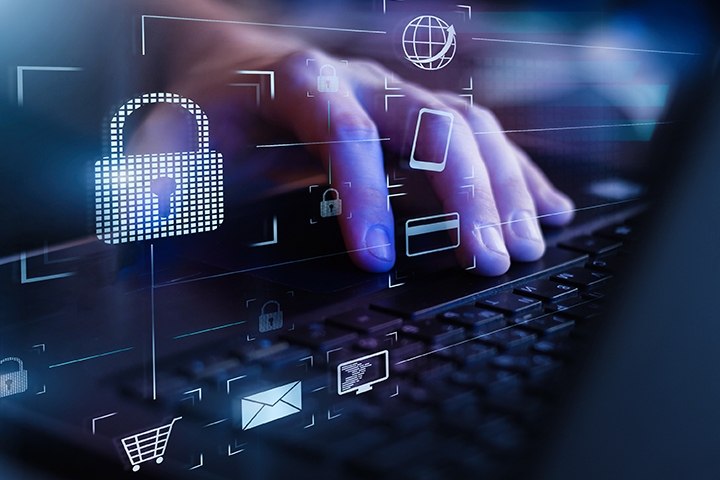 Closeup view of man`s hand using laptop with virtual digital screen with icon of lock on it.