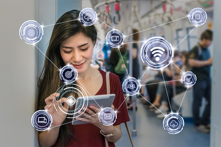 Woman looking at her tablet, digital image of strong links between customer services