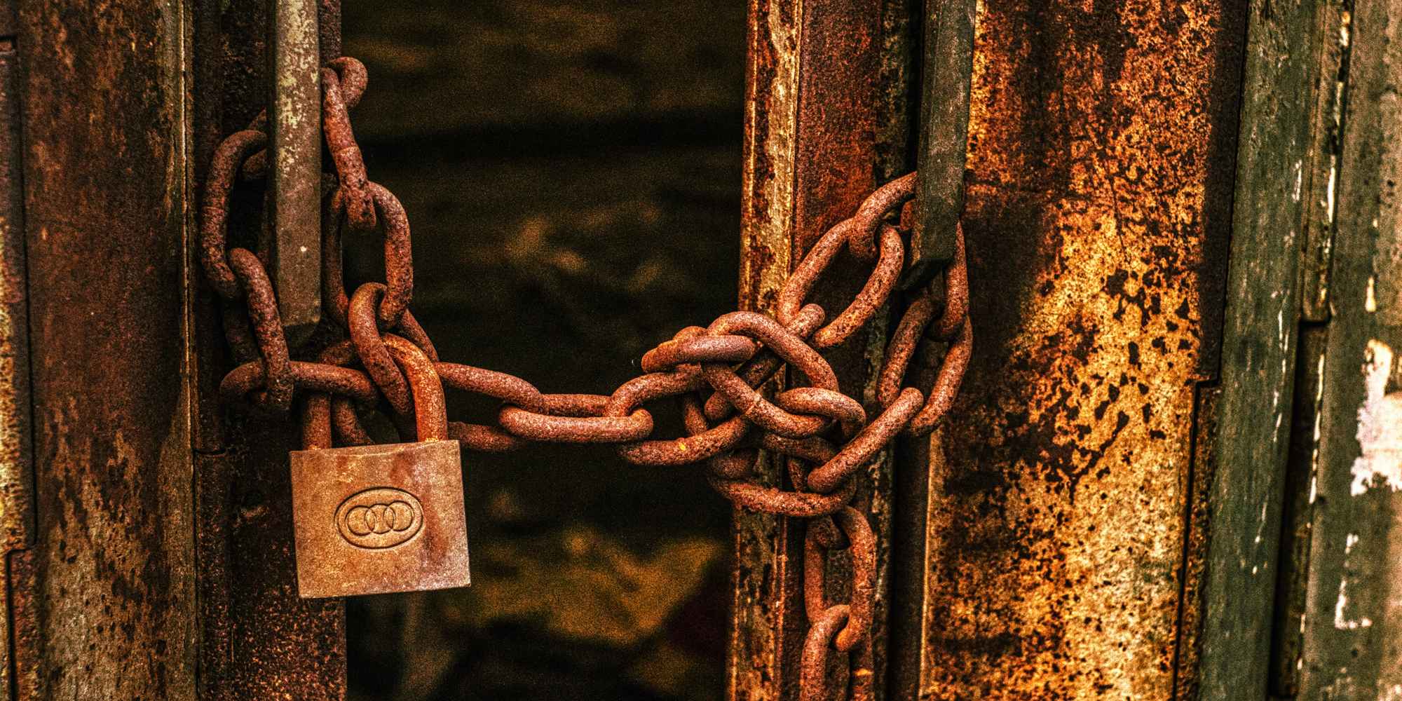 chain and lock on a door, close up shot