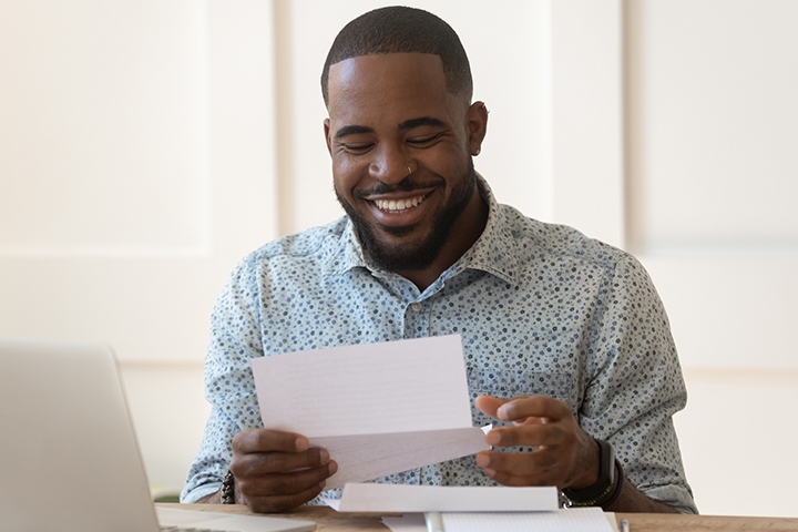 Man reading mail