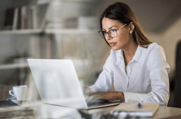 Businesswoman working on laptop