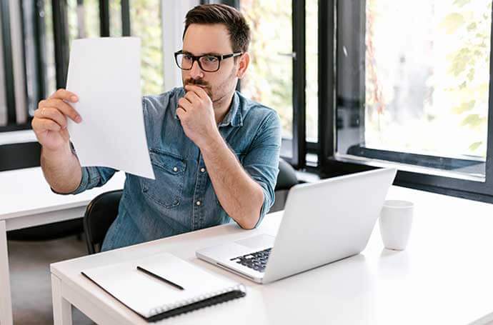 man reading document