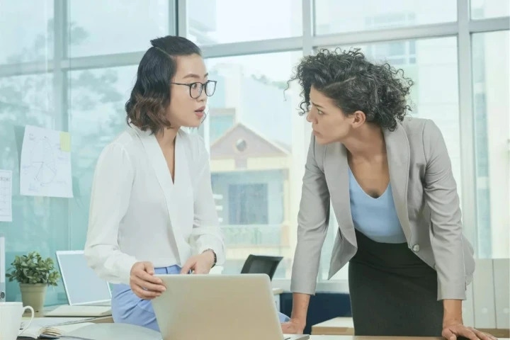 two professionals discussing