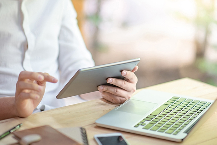 man at desk with laptop
