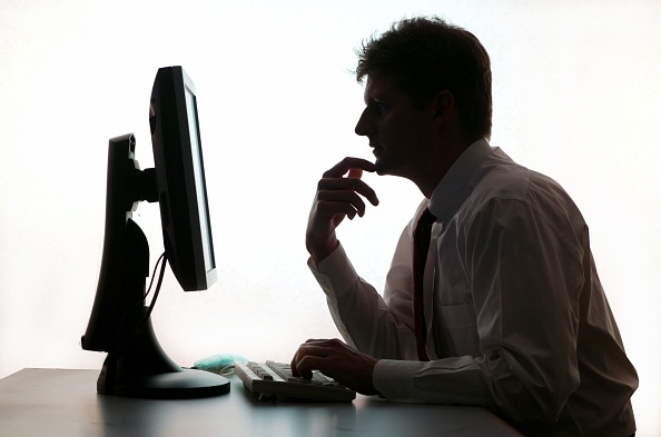 businessman in front of computer