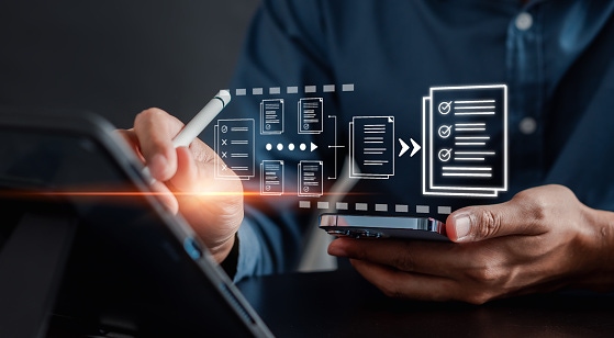 Person holding a smartphone while interacting with floating digital document icons representing document management, data exchange, and digital workflow systems.