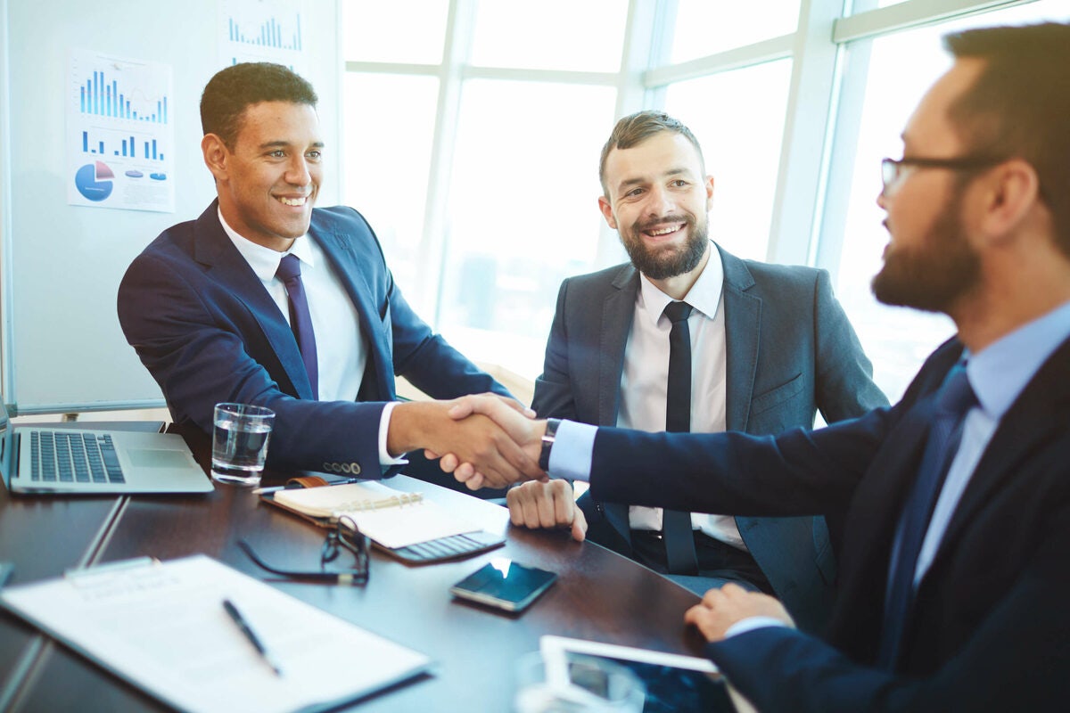 businessmen hand shaking