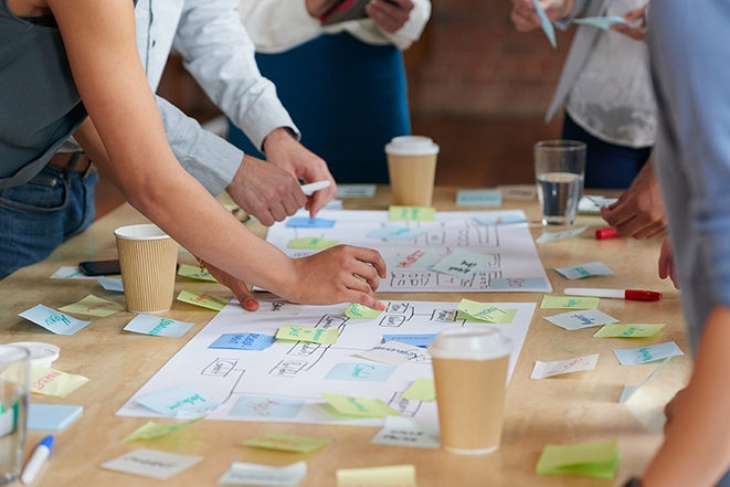 professionals working on a table together